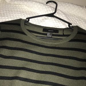 Tight fitted green and black striped dress